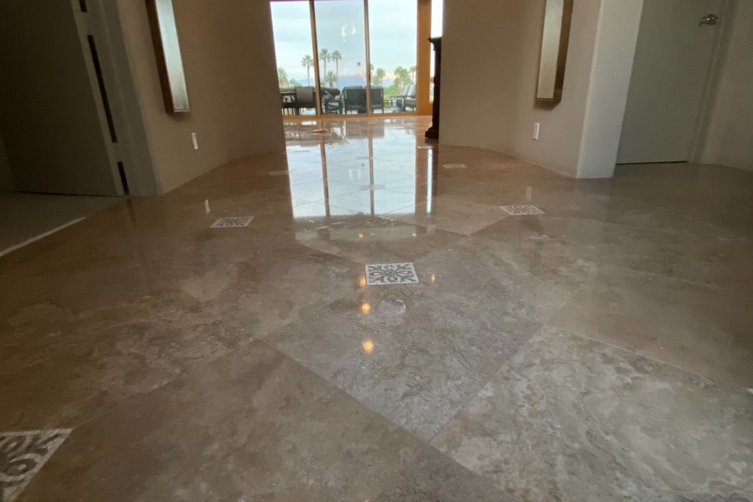 Travertine floor in Huntington Beach, displaying a smooth finish after StoneShine’s professional cleaning, polishing, and sealing services.