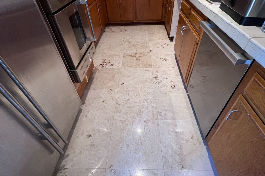 Restored floor in the kitchen after StoneShine's travertine floor restoration service in West Hollywood